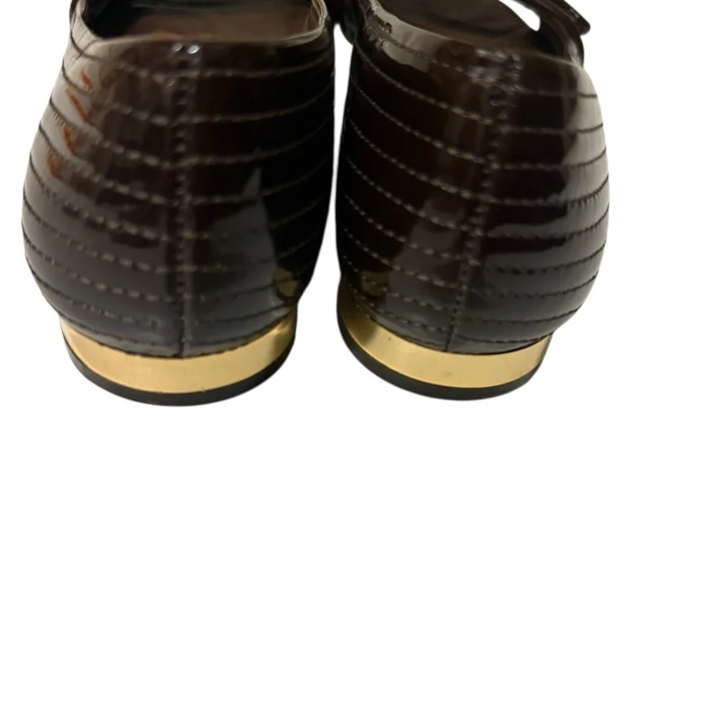 Tory burch Elegant Brown Women's shoes in hood condition just inside peeled
